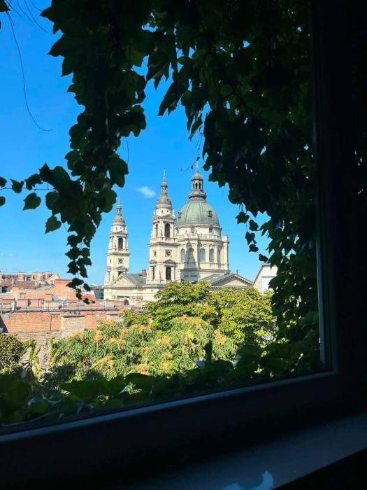Unique view of the Basilica and the Ferris Wheel in Budapest