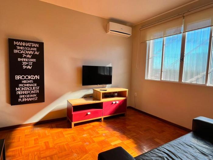 Apartamento central com 3 dormitórios