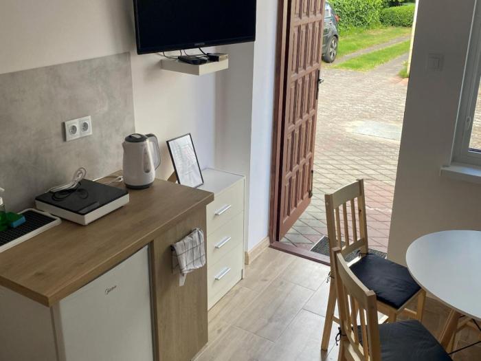 Comfortable 4-person room with kitchenette