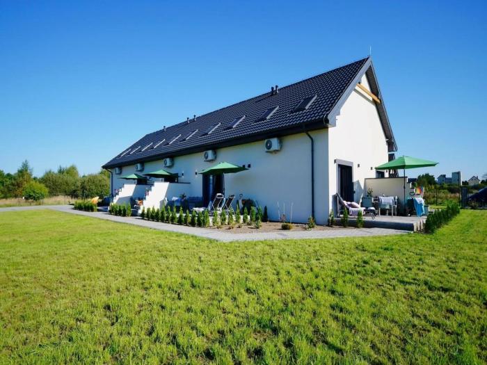 Spacious holiday homes with terraces, Mielenko