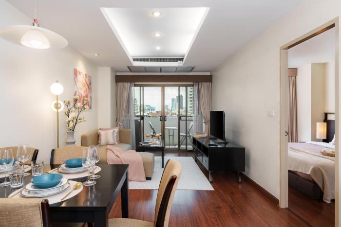 Mystic Haven King Bed Suite with Balcony & City Views