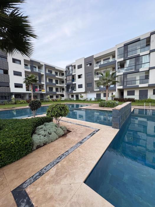 Beach Apartment with Pools, Gym & Parking - Beachland Residence