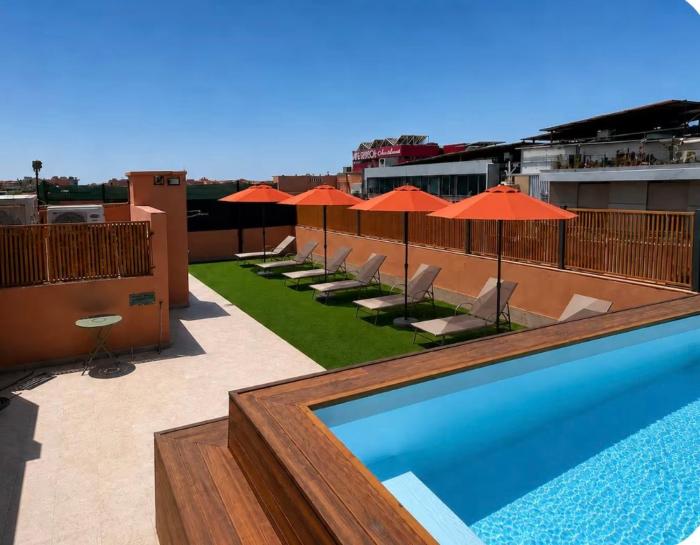 Appartement au centre-ville avec piscine