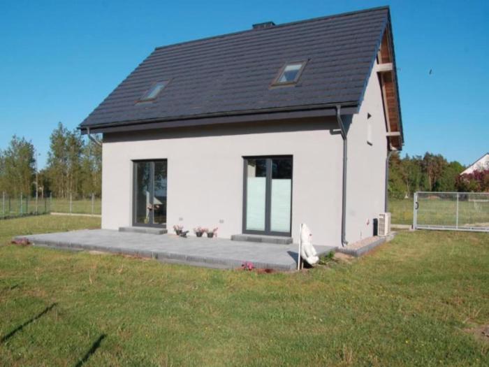 Half of a holiday home with a large garden