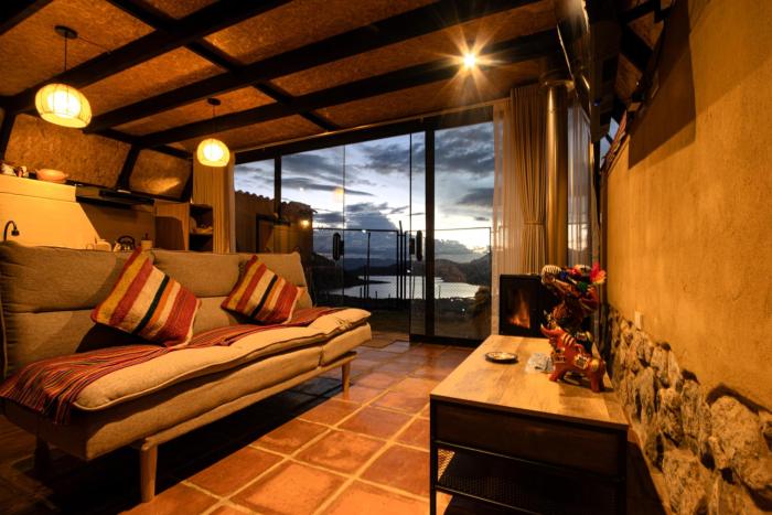 Cabin overlooking the Huaypo Lagoon in the Sacred Valley, Cusco