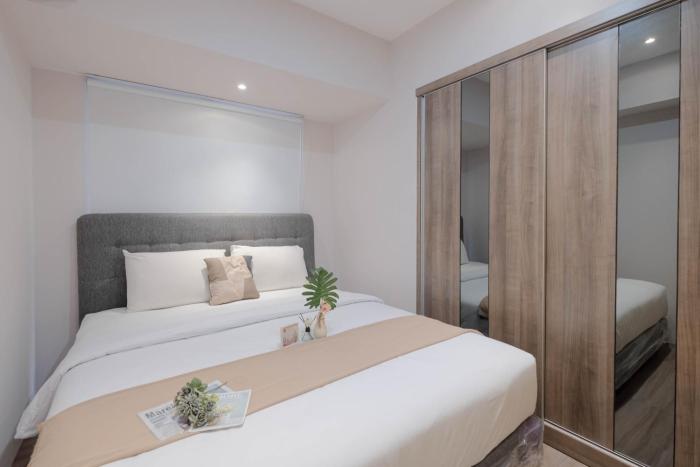 Contemporary and Spacious 1BR at Apartment Tokyo Riverside PIK 2 By Travelio