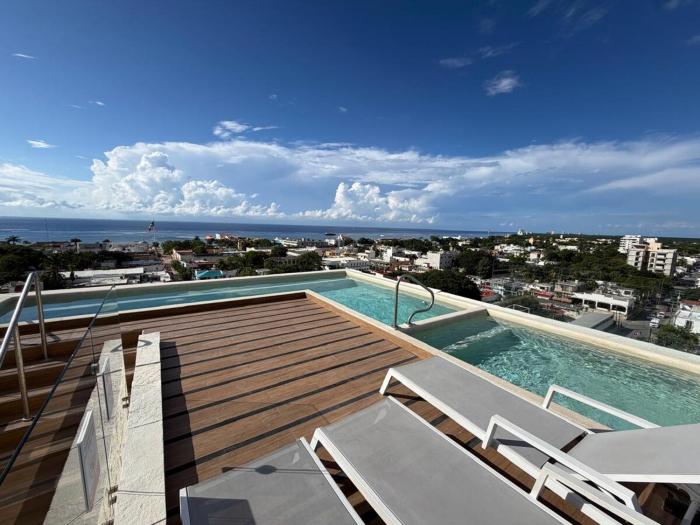 Stylish apartment with pool and gym in Cozumel