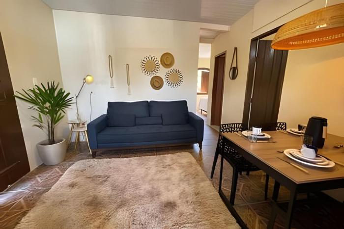 Casa confortável com garagem e churrasqueira