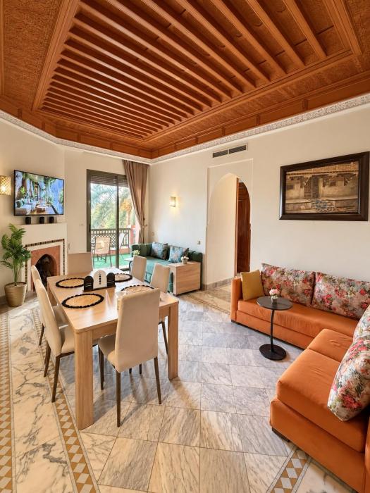 Chic Palm Grove Apartment Pool View