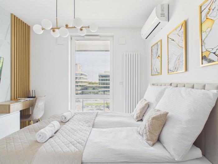 Modern Space Premium Studio with Balcony & AC by Solarento
