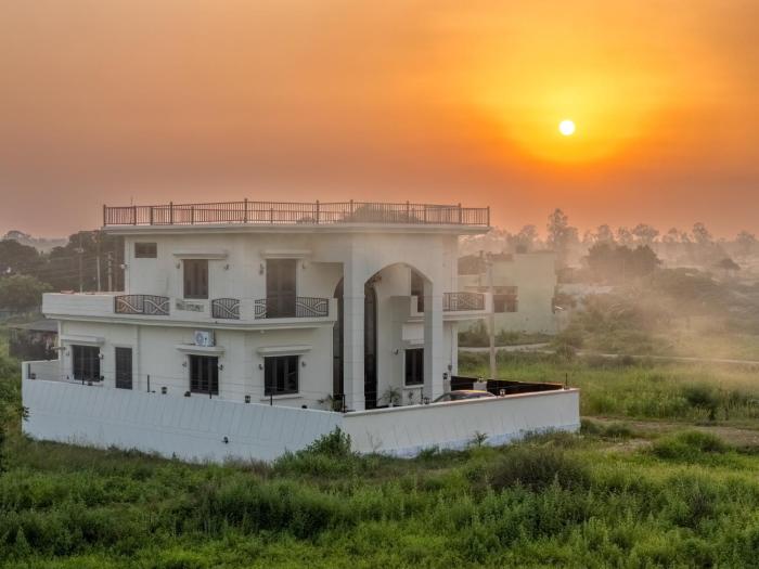 ELIVAAS Signature Mannat Villa 4-BHK English-Style Forest-View Villa with Covered Deck, Swing, Table Tennis & Lawn