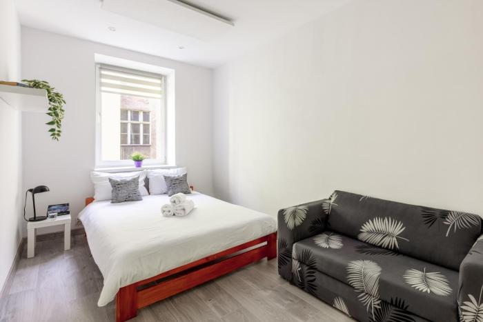 Piłsudskiego City Center Apartment by BookingHost