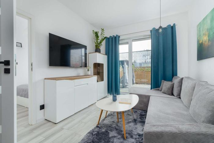 Przytulny Apartament z Prywatnym Ogrodem by Noclegi Renters