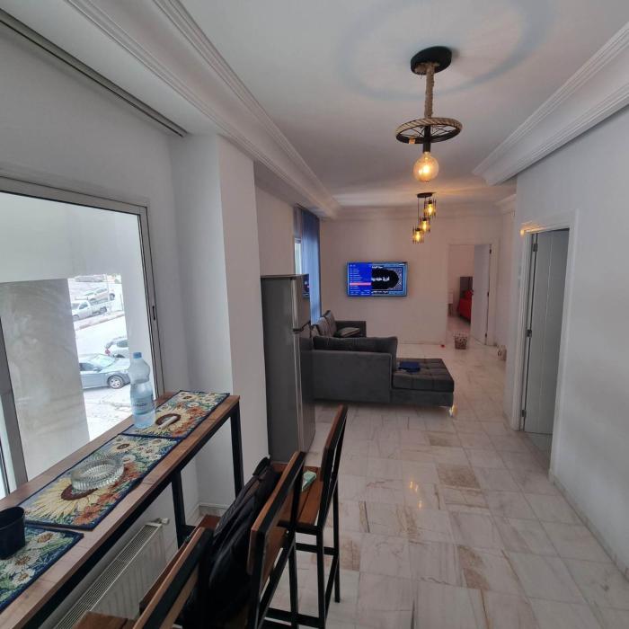 Cozy Stay Ennasr Apartment