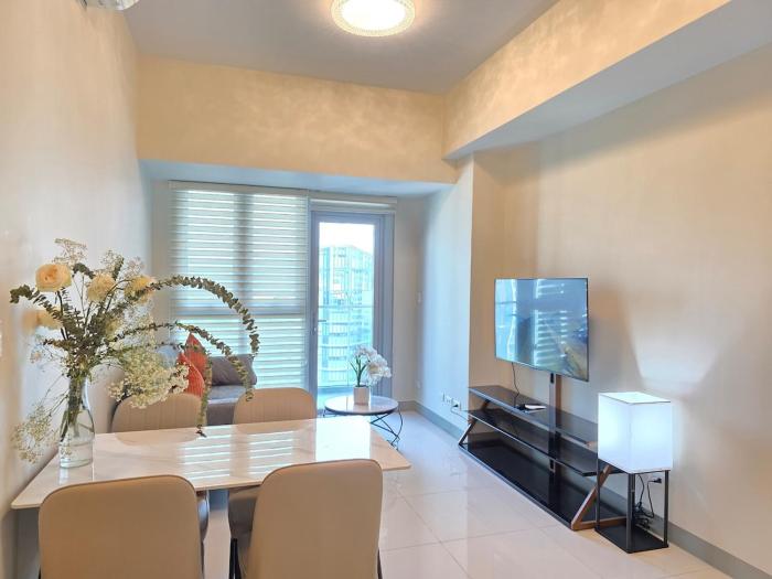 BGC Uptown Parksuites Luxury Two Bedroom Zen inspired Unit Steps to Mitsukoshi Grand Hyatt Hotel and St Lukes