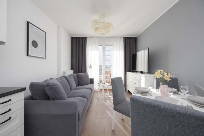 Modern Apartment with Desk and Balcony by Noclegi Renters