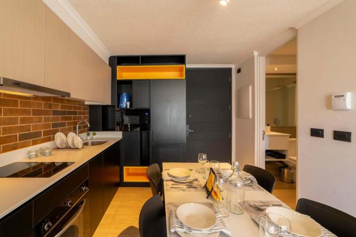 Chic Studio Retreat Steps from Costanera Center