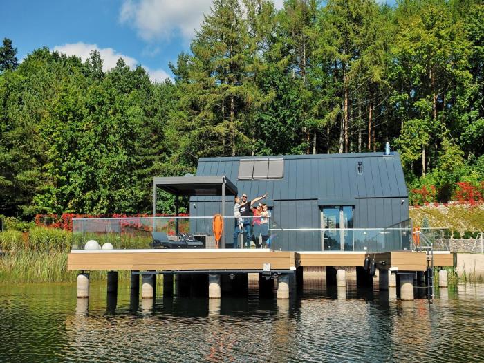 Holiday home with private lake and beach