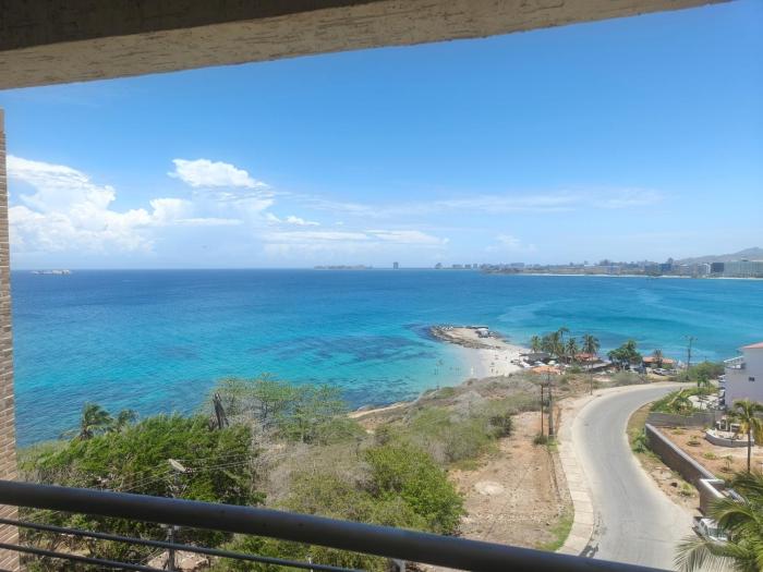 Ocean Views • Walk to Beach • Pool • Balcony