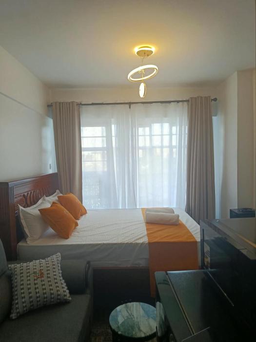 Grand Midtown Executive studio with a balcony view