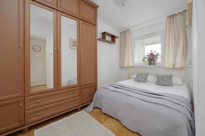 Air-conditioned Apartment with a view of the Palace of Culture and Science in Warsaw by Noclegi Renters
