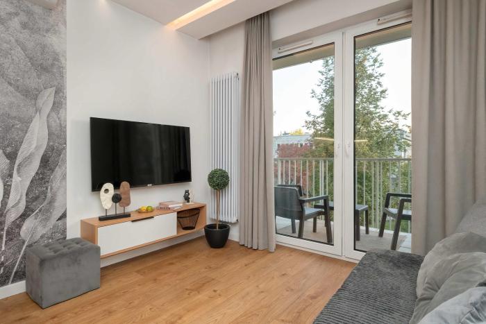 Comfortable Apartment with Air Conditioning and Parking by Noclegi Renters