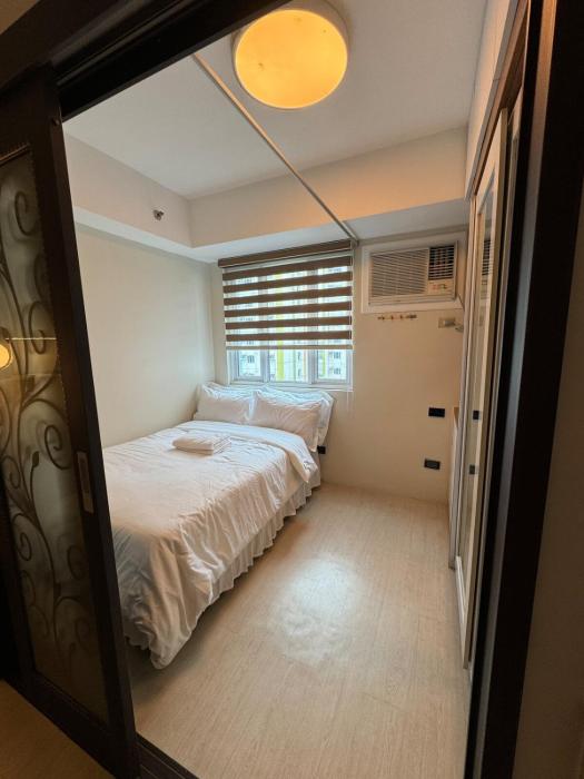 Cozy 1 Bedroom Condo Unit at Mplace Tower B