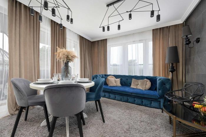 Przestronny Apartament z Sauną i Tarasem by Noclegi Renters