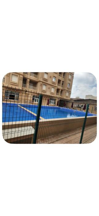 F3 haut standing avec piscine et parking au centre-ville bejaia
