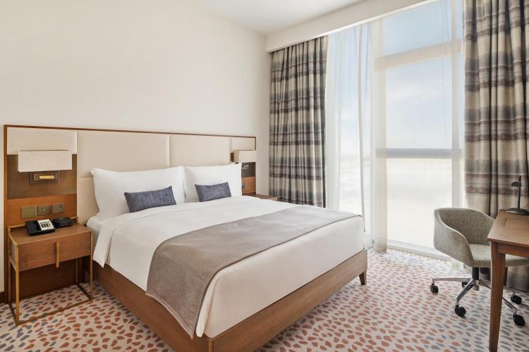 Suite mit 1 Schlafzimmer mit Kingsize-Bett und Poolblick - Nichtraucher