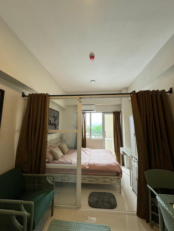 One-Bedroom Apartment with Balcony and City View