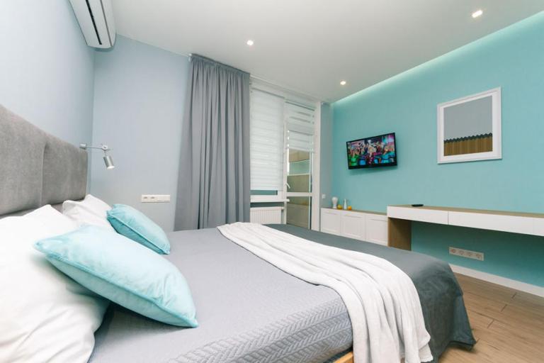 Happy apartment, warmth, comfort, turquoise - B&B Kyiv
