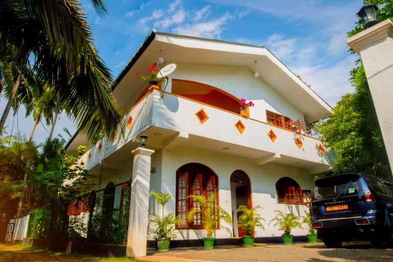Mali Guest House - Ferienwohnung Hikkaduwa