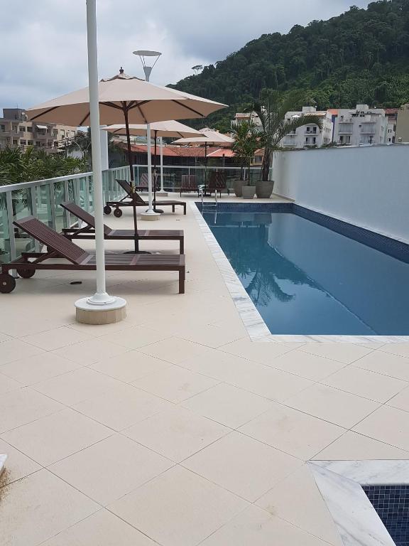 Apartamento em Ubatuba - Praia Grande com Wifi gratuito, rede de proteção e todo conforto que você merece - Ferienwohnung Ubatuba