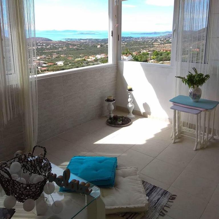 Outstanding Panoramic View, 10΄ beach, 20΄ airport - Ferienwohnung Lopésion