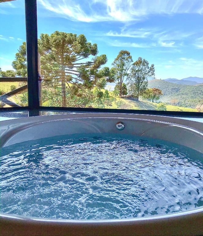 Chalés Encanto Das Pedras - Chalé Super Luxo - Bed and Breakfast Sapucaí-Mirim