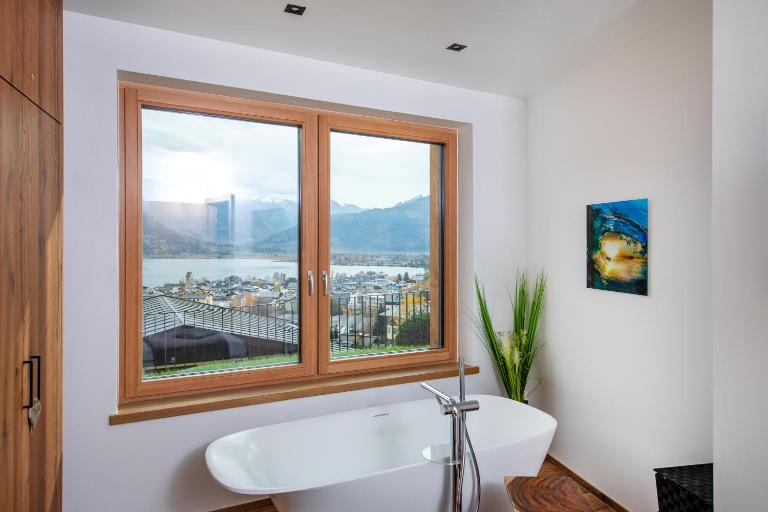 Apartments Adlerhorst Top 1 Zell am See with private sauna and Zell am See Kaprun summercard in summer - B&B Zell am See