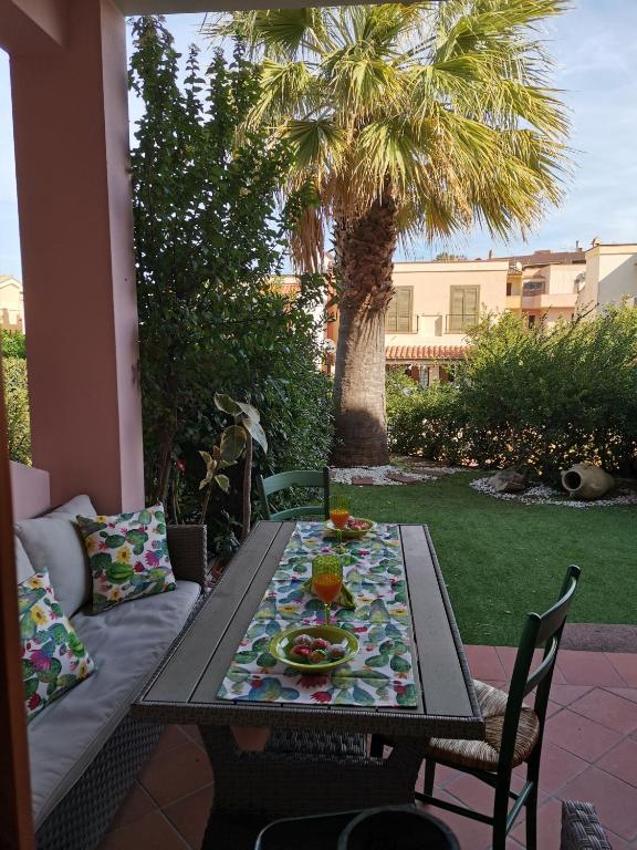 Villetta con giardino in Residence IN CENTRO - Ferienwohnung Villasimius