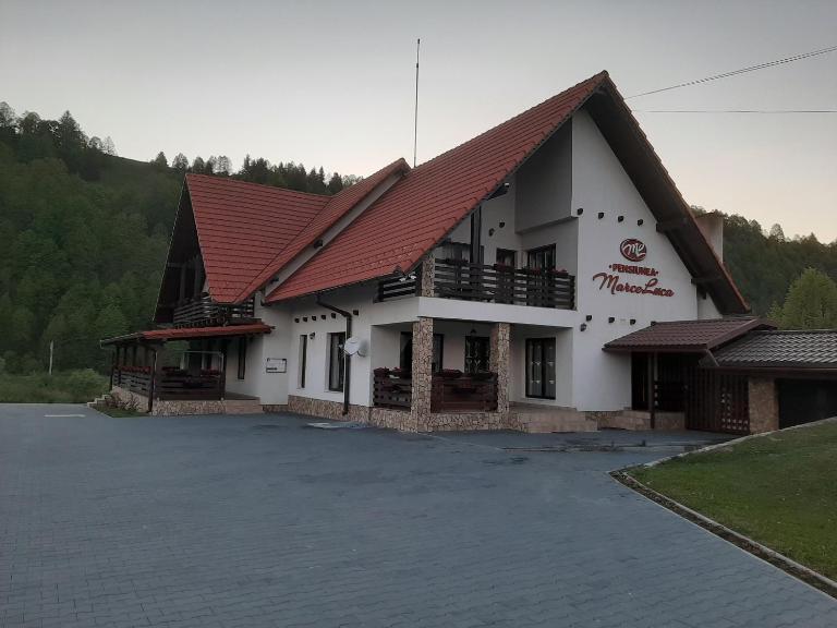 Pensiunea Marceluca - Ferienwohnung Hodoșa