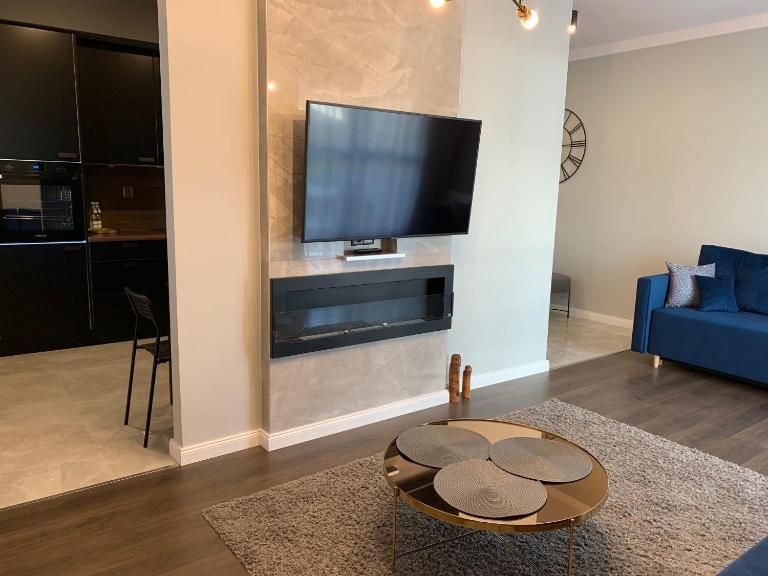 Apartament WARMIA Olsztyn 58m2 - 2 pokojowy apartament z podziemnym miejscem postojowym - B&B Olsztyn