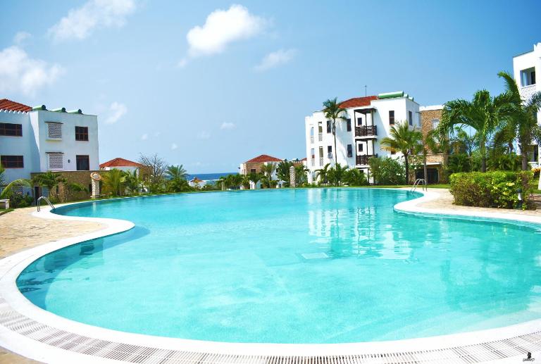 Sultan Palace Beach Resort - AMANI Apartment CB2-202 - B&B Kikambala