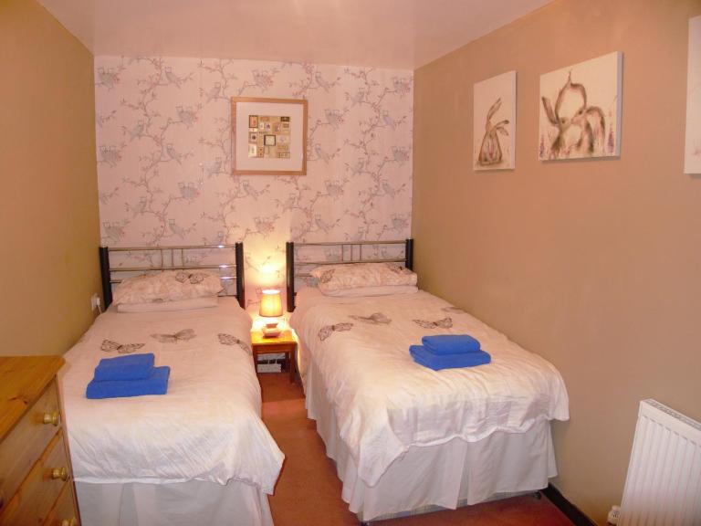 Cae Berllan Holiday Cottages - Chambres d'hôtes Groeslon