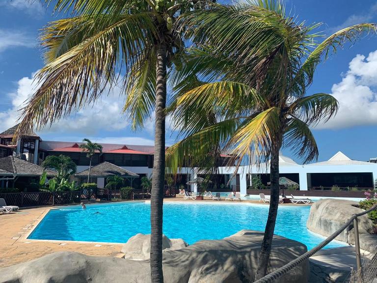 Appartement au village Manganao plage piscine - B&B Saint-François