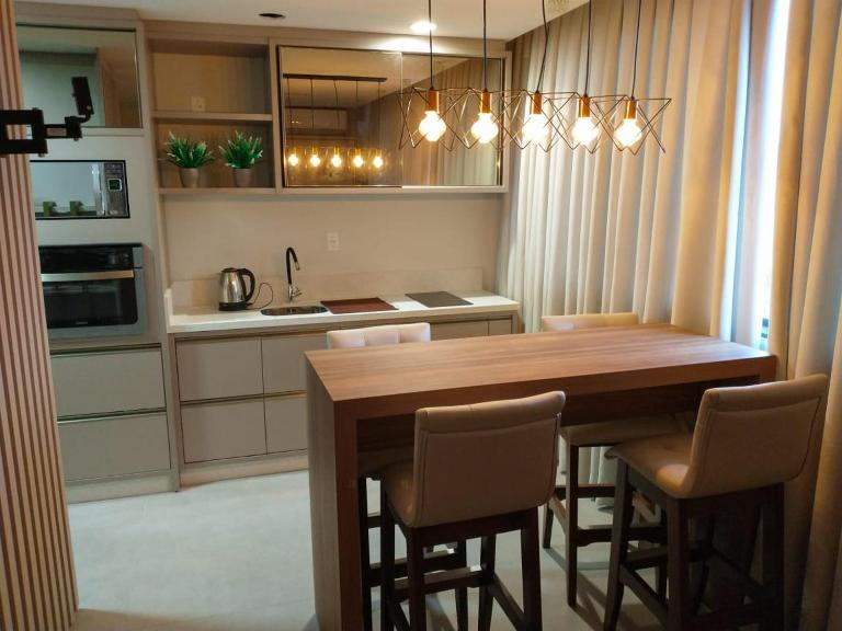 Apto com vista para o mar e o farol - loft 323 - Chambres d'hôtes Laguna
