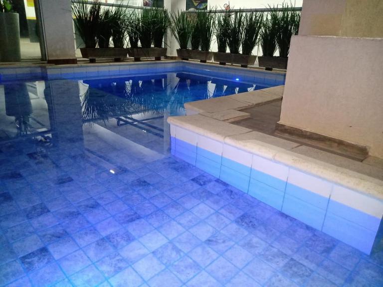 Flat Olímpia com Área de Churrasqueira privada e tudo novo - Ferienwohnung Olímpia