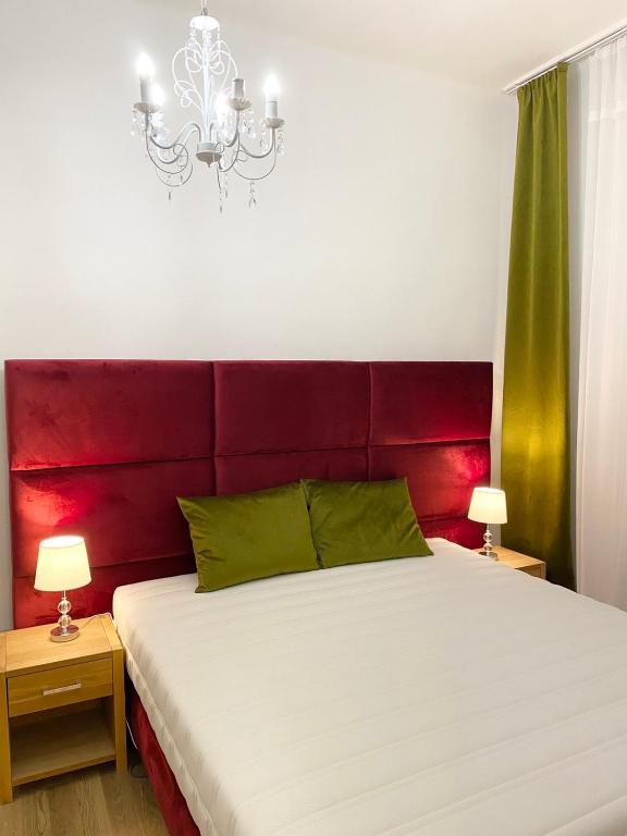 Platános Apartman Tata - Chambres d'hôtes Tata
