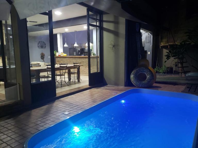Quintal Secreto com Piscina Aquecida - B&B Brotas