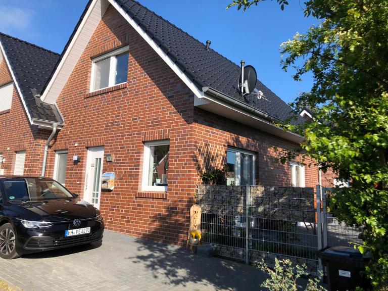 Feriendomizil Dornum Haus Willy mit Wintergarten und Wallbox - B&B Dornum