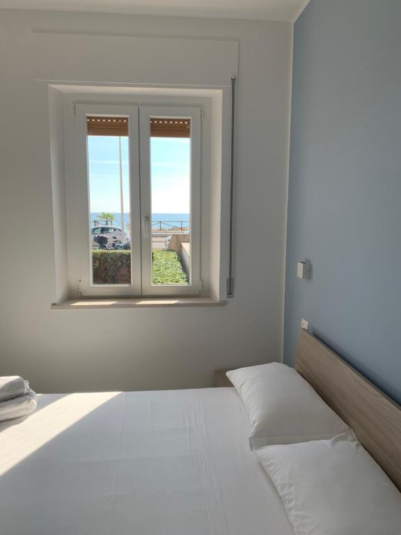 Appartamento fronte mare con giardino - B&B Porto Recanati