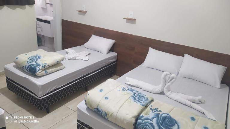 Pousada Quarto completo ar,wi fi e garagem gratuita - Chambres d'hôtes Aparecida